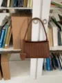 Chic brown woven leather shoulder bag with braided handle for chic daily commute style - Coffee Brown