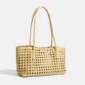 Woven cut-out leather shoulder bag for women, elegant beige tote bag with double braided handles. - Yellow