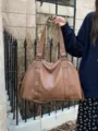 Large capacity brown leather travel tote bag, stylish shoulder and crossbody bag for daily use. - Brown