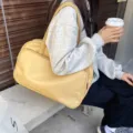 Large capacity yellow travel shoulder bag, stylish casual tote for daily commuting and trips. - Milk Yellow