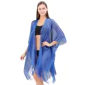 Blue metallic shimmer beach cover-up shawl detail showing sparkling fabric and fringe hemline. - Sapphire Blue