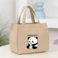 Canvas lunch bag detail showing cute panda graphic print and handy front pocket design. - Milk Bottle Panda Bento Bag / 25*16*22cm / Khaki