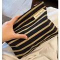 Schwarze goldene gestreifte Kosmetiktasche tragbare Make-up Tasche Reise Organizer. - Gestreiftes Schwarzgold