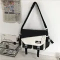 Canvas messenger bag for men and women, stylish colorblock crossbody shoulder bag, large capacity. - Black