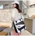 Canvas messenger bag with large capacity, black and white color block design, casual style. - Waterproof Black with Button Pendant