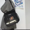 Large capacity black canvas crossbody bag with multi pockets and tactical style design. - Black