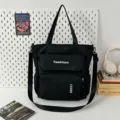 Black canvas tote bag with multiple pockets, large capacity shoulder and crossbody bag for daily use. - Black