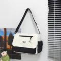 Casual black and white nylon messenger bag, large capacity shoulder bag for daily school use. - 31x25x11cm / Black