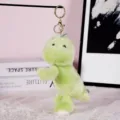 Green dinosaur plush keychain, cute soft fluffy animal hanging ornament for bags and keys detail. - Green Dinosaur (Gold Keychain)