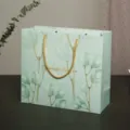 Elegante eucalyptus blad papieren cadeautas, groene tas voor cosmetica en feestbedankjes. - Kleine Maat 14x15x7cm / Blauw Eucalyptusblad