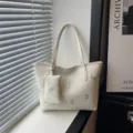 Trendy niche tote bag for women, summer new stylish commuting shoulder bag, chic design. - White