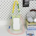 Colorful dopamine color-blocked crossbody phone bag with drawstring and multi-colored straps. - Green