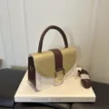 Elegante dames handtas van PU-leer, stijlvolle schoudertas met handvat en handige riem. - Goud