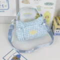 Blau-weiße Karomuster Umhängetasche für Damen, lässige Canvas-Tasche mit praktischer Fronttasche. - Blau