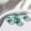 Green hollow glass wheel beads for DIY jewelry making, stunning transparent accessories. - 2 Pieces Pack / 7# Dark Green