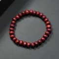 Pulsera elastica minimalista de cuentas de madera redondas rojo oscuro para unisex. - Marrón Rojo