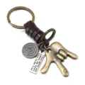 Vintage metal gesture keychain with braided cowhide rope, retro bronze key ring. - Brown