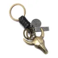 Vintage metal bull skull keychain with braided leather strap, retro key ring for men pants chain. - Black