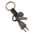 Vintage metal plug keychain with black leather rope and engraved metal charm pendant for men. - Black