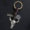 Vintage metal bull skull keychain with leather braided rope and cool pendant for men. - Antique Silver