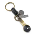 Vintage metalen lepel sleutelhanger met zwart lederen gevlochten touw en gegraveerde tag. - Zwart