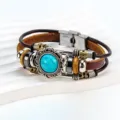 Pulsera de cuero multicapa vintage con gran dije de turquesa y cierre de acero inoxidable chic - Estilo Turquesa / Marrón