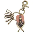 Llavero de calavera de bronce vintage con correa de cuero, diseño de esqueleto gótico. - Estilo de Bloque de Cuero / Marrón
