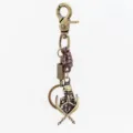 Llavero de calavera de bronce vintage con cuerda de cuero, anillo punk para hombre. - Hebilla de Resorte Correa de Cuero / Bronce Antiguo