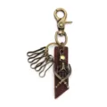 Porte-clés tête de mort vintage en alliage avec lanière en cuir et finition bronze. - Bronze