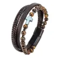 Pulsera de cuero multicapa con cuentas de ojo de tigre, dije de cruz y cierre magnético elegante. - Ojo de tigre