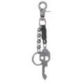 Porte-clés métal punk vintage avec pendentif crâne, lanière en cuir et ouvre-bouteille. - Noir