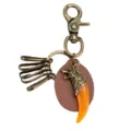 Llavero vintage de cabeza de lobo con colgante de diente naranja de resina y cuero marrón. - Estilo de Bloque de Cuero / Marrón