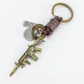Llavero de rifle de juego retro de aleación con envoltorio de cuero, colgante de metal. - Estilo Anillo Plano Cuero Café / Como se muestra