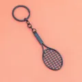 Llavero de raqueta de tenis de metal negro, colgante de bolso elegante para los aficionados. - Bolsa de polietileno / Negro