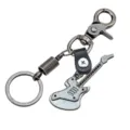 Metal guitar keychain detail shot, vintage alloy and leather key ring pendant design. - Guitar / Antique Silver