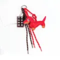 Cute red leather dachshund bag charm with chocolate pendant and braided rope straps key ring. - OPP Bag / Red