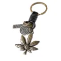 Porte-clés feuille de cannabis en alliage vintage avec corde en cuir tressé et anneaux - Marron