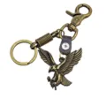 Vintage bronze metal eagle keychain with lobster clasp, key ring and leather strap accessory. - Eagle Spring Buckle Style