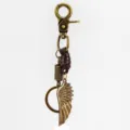 Porte-clés vintage aile d'ange en métal bronze et lanière en cuir accessoire détail. - Style D / Bronze Antique