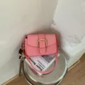 Pink textured shoulder bag for women, stylish crossbody small square bag with metal buckle and chic charm. - With Pendant / Pink