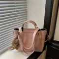 Chic stylish pink shoulder bucket bag for women, elegant PU leather crossbody with cute bear charm. - With Pendant / Pink