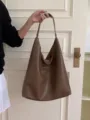 Brown PU leather slouchy hobo bag detail shot, showing soft texture and large capacity daily carry. - Brown