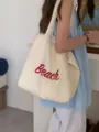 Detail view of casual nylon canvas tote bag with Beach embroidery, large capacity shoulder bag. - White
