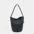 Stylish women black leather bucket bag, versatile shoulder handbag for daily commute. - Black