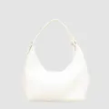 Minimalist white pebbled leather underarm bag detail, sleek crescent shape handbag. - White