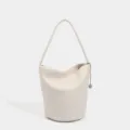 Minimalist off-white soft leather bucket bag for women, versatile chic shoulder handbag. - White