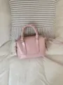 Pink bowling handbag for women, PU leather retro crossbody bag, stylish commuter shoulder bag. - Pink
