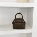 Dark brown small handbag with top handle and front pocket for women, versatile crossbody. - Standard / Coffee
