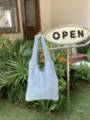 Borsa tote in maglia uncinetto azzurro chiaro, borsa a spalla traforata casual per lavoro. - Azzurro