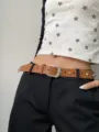 Brown patent leather belt with rhinestones and heart cutouts, stylish women accessory for jeans. - Khaki